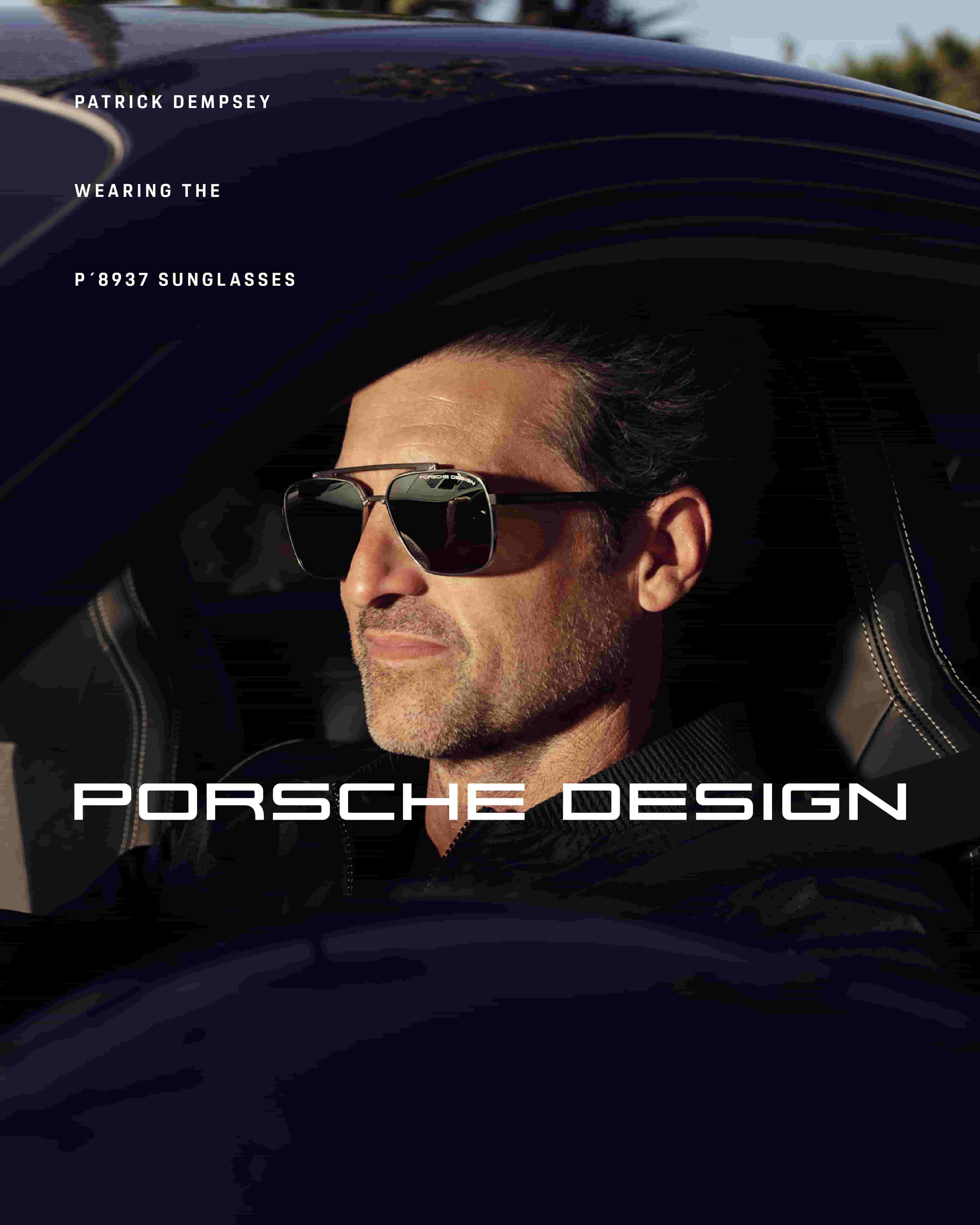 Schauspieler Patrick Dempsey sitzt in einem Porsche und trägt die Sonnenbrille Hexagon P8937 von Porsche Design.